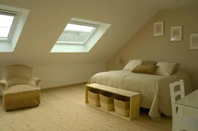 Un ou plusieurs lits dans un hébergement de l'établissement Le gîte Marie-Galante : Belle maison d'hôtes avec accès piscine en été