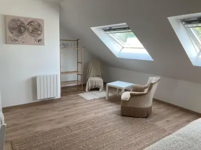 Coin salon dans l'établissement Le gîte Marie-Galante : Belle maison d'hôtes avec accès piscine en été