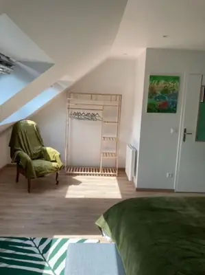 Coin salon dans l'établissement Le gîte Marie-Galante : Belle maison d'hôtes avec accès piscine en été