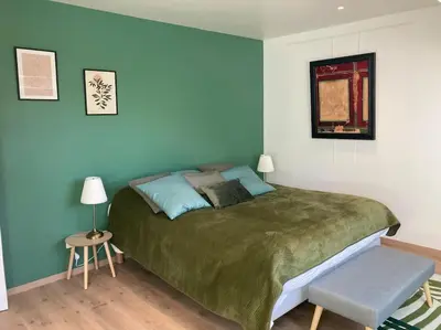Un ou plusieurs lits dans un hébergement de l'établissement Le gîte Marie-Galante : Belle maison d'hôtes avec accès piscine en été