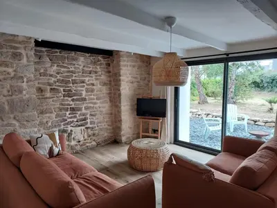 Coin salon dans l'établissement Maison de vacances - 3 chambres - proximité plage