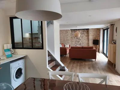 Coin salon dans l'établissement Maison de vacances - 3 chambres - proximité plage