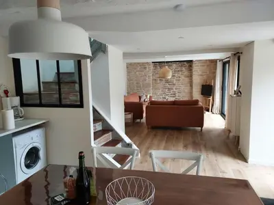 Coin salon dans l'établissement Maison de vacances - 3 chambres - proximité plage