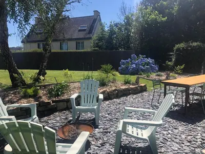 Jardin de l'établissement Maison de vacances - 3 chambres - proximité plage