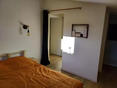 Un ou plusieurs lits dans un hébergement de l'établissement Maison de vacances - 3 chambres - proximité plage