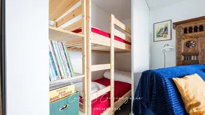 Un ou plusieurs lits dans un hébergement de l'établissement ROSEMARINE - APPARTEMENT CONCARNEAU VUE MER 2 adultes/2enfants