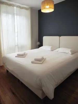 Un ou plusieurs lits dans un hébergement de l'établissement Appartement au cœur de Brest