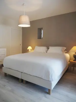 Un ou plusieurs lits dans un hébergement de l'établissement Maison de charme à Porspoder Piscine extérieure, proche plages & calme