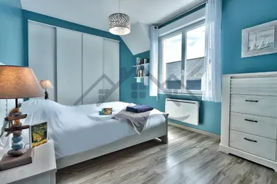 Un ou plusieurs lits dans un hébergement de l'établissement LocaLise - M2C - Ty Ma Bro -Maison avec extérieur entièrement clos - Wifi inclus - Draps inclus- Animaux bienvenus