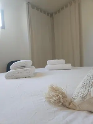 Un ou plusieurs lits dans un hébergement de l'établissement Le loft