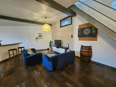 Télévision ou salle de divertissement dans l'établissement Le loft