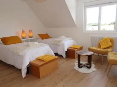 Un ou plusieurs lits dans un hébergement de l'établissement Villa Ty PY : Charme moderne et tranquillité