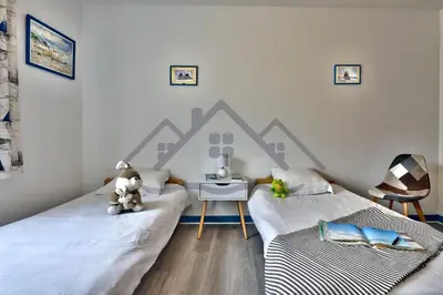 Un ou plusieurs lits dans un hébergement de l'établissement LocaLise - M2B - Maison de vacances à la pointe de Lechiagat - Wifi inclus - Draps inclus - Terrain entièrement clos - Maison de plain pied