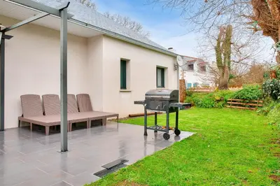 Jardin de l'établissement Maison pour 7 - jardin - accès pmr - 5min plage