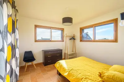Un ou plusieurs lits dans un hébergement de l'établissement Ty Jane Dour - Maison avec jardin