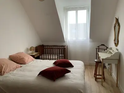 Un ou plusieurs lits dans un hébergement de l'établissement Maison Typenarch vue étang à 400m de la plage