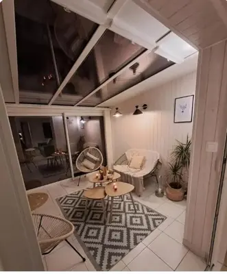Coin salon dans l'établissement Maison de vacances à 500m de la mer