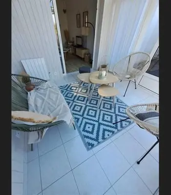 Coin salon dans l'établissement Maison de vacances à 500m de la mer
