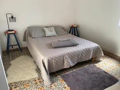 Un ou plusieurs lits dans un hébergement de l'établissement TY MAI - petite maison proche plages et commerces