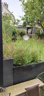 Jardin de l'établissement TY MAI - petite maison proche plages et commerces