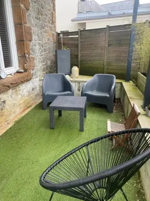 Coin salon dans l'établissement TY MAI - petite maison proche plages et commerces