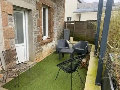 Coin salon dans l'établissement TY MAI - petite maison proche plages et commerces