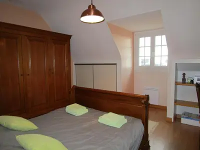 Un ou plusieurs lits dans un hébergement de l'établissement Deckerveillant chambres près de la mer