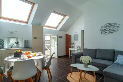 Coin salon dans l'établissement Killiouarn - Charmante maison à 15min des plages