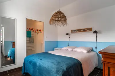 Un ou plusieurs lits dans un hébergement de l'établissement Killiouarn - Charmante maison à 15min des plages
