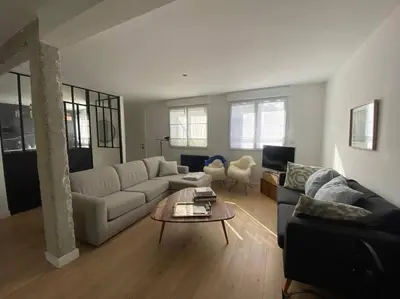 Coin salon dans l'établissement Maison 3 chambres proche mer