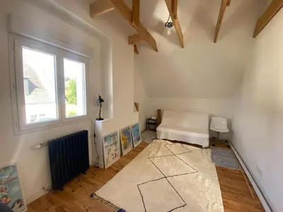 Coin salon dans l'établissement Maison 3 chambres proche mer