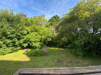 Jardin de l'établissement Maison 3 chambres proche mer