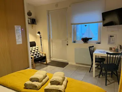 Télévision ou salle de divertissement dans l'établissement L'Atelier de Mézareun