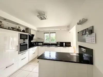 Cuisine ou kitchenette dans l'établissement Maison de charme au calme