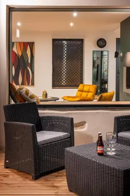 Coin salon dans l'établissement NOUVEAUTE!!! Villa en bord de mer avec piscine intérieure!