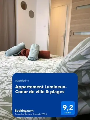 Un ou plusieurs lits dans un hébergement de l'établissement Appartement Lumineux-Coeur de ville & plages
