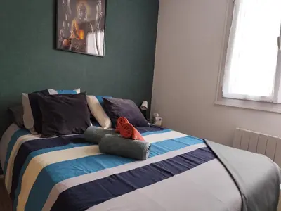 Un ou plusieurs lits dans un hébergement de l'établissement Appartement Lumineux-Coeur de ville & plages