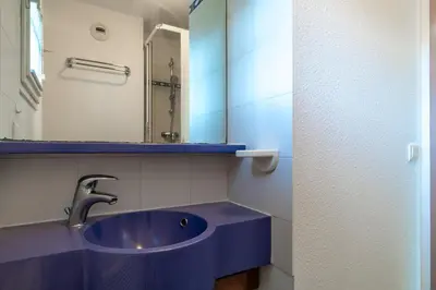 Salle de bains dans l'établissement L’Estuaire - Appt avec piscine partagée