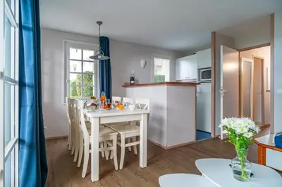 Cuisine ou kitchenette dans l'établissement L’Estuaire - Appt avec piscine partagée