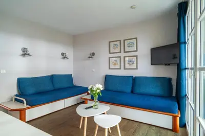 Coin salon dans l'établissement L’Estuaire - Appt avec piscine partagée