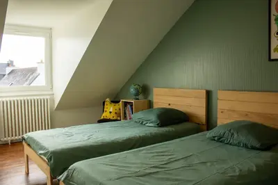 Un ou plusieurs lits dans un hébergement de l'établissement Ti Ar Mor/VUE MER/WIFI