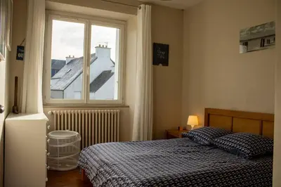 Un ou plusieurs lits dans un hébergement de l'établissement Ti Ar Mor/VUE MER/WIFI