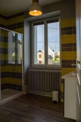 Un ou plusieurs lits dans un hébergement de l'établissement Ti Ar Mor/VUE MER/WIFI