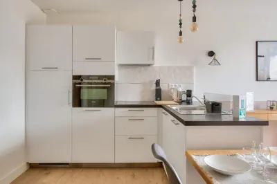 Cuisine ou kitchenette dans l'établissement À 450 m de la 