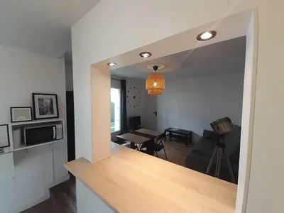 Télévision ou salle de divertissement dans l'établissement Maison T2 en bord de mer à Plougastel Daoulas