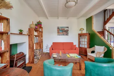 Coin salon dans l'établissement À 700m de la plage, charmante maison pour 6