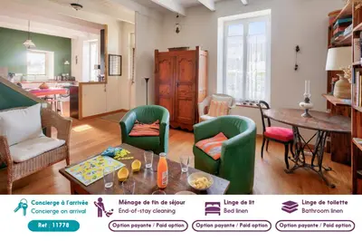 Coin salon dans l'établissement À 700m de la plage, charmante maison pour 6