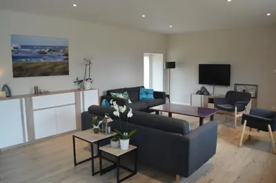 Télévision ou salle de divertissement dans l'établissement Gîte de LANVIAN