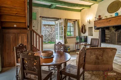 Coin salon dans l'établissement La maison du Cocher