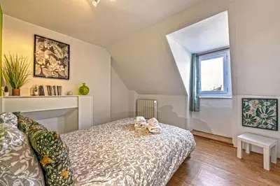 Un ou plusieurs lits dans un hébergement de l'établissement Maison Rioma - Grande maison à 200m de la plage